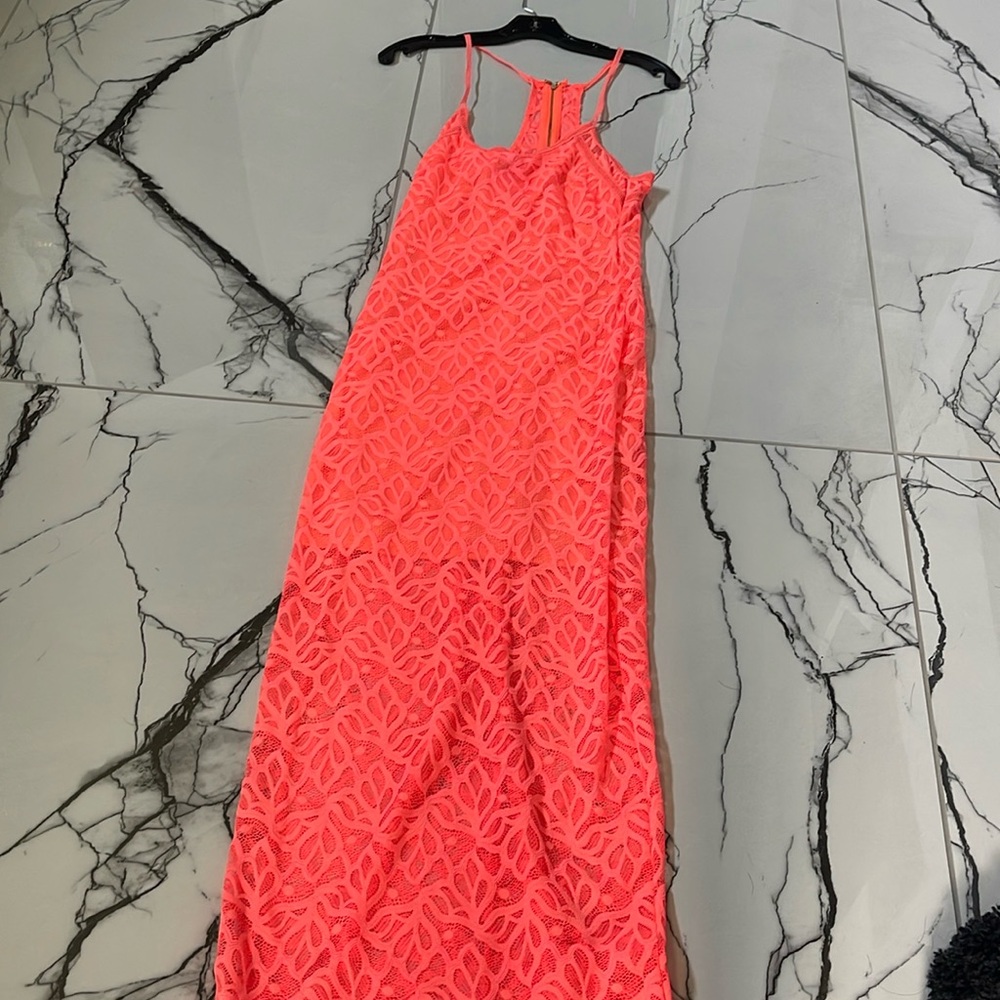Bebe , orange muscle tank dress with spaghetti straps. Size small.